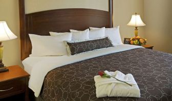 King bed at Staybridge Suites Oakville-Burlington.