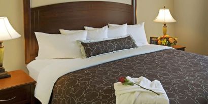 King bed at Staybridge Suites Oakville-Burlington.