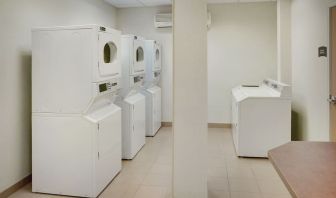 Laundry room at Staybridge Suites Oakville-Burlington.