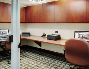 Business center with computers, printers and ergonomic chairs at Staybridge Suites Oakville-Burlington.