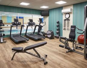 Fully equipped fitness center at Staybridge Suites Oakville-Burlington.