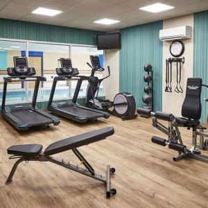 Fully equipped fitness center at Staybridge Suites Oakville-Burlington.