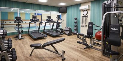 Fully equipped fitness center at Staybridge Suites Oakville-Burlington.