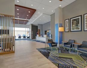 Hotel lobby with lounge area at Holiday Inn Express Kingston West.