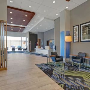 Hotel lobby with lounge area at Holiday Inn Express Kingston West.