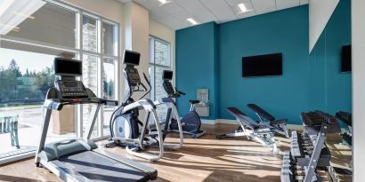 Fully equipped fitness center at Holiday Inn Express Kingston West.