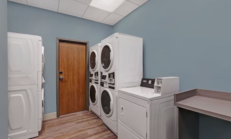 Laundry room at Holiday Inn Express Kingston West.