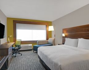 Day use room with TV, sofa, work desk and private bathroom at Holiday Inn Express Kingston West.