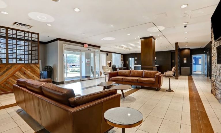 Hotel lobby with lounge seating at Four Points By Sheraton Toronto Mississauga.