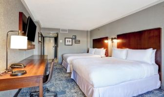 Day use twin room with TV, work desk and private bathroom at Four Points By Sheraton Toronto Mississauga.