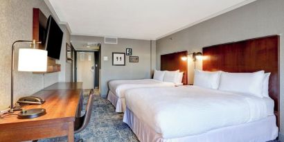 Day use twin room with TV, work desk and private bathroom at Four Points By Sheraton Toronto Mississauga.