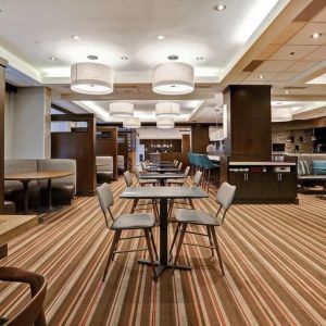 Dining area with comfortable seating perfect for co-working at Four Points By Sheraton Toronto Mississauga.