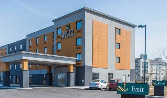 Hotel exterior with parking area at Quality Inn & Suites Kingston.