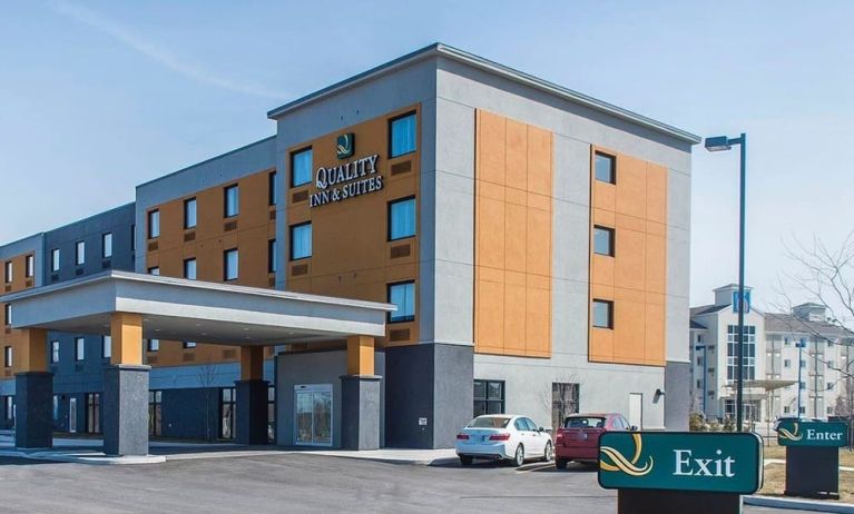 Hotel exterior with parking area at Quality Inn & Suites Kingston.