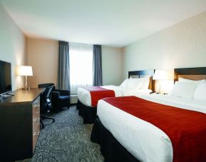 Day use twin room with TV, work desk and private bathroom at Quality Inn & Suites Kingston.