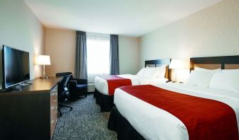 Day use twin room with TV, work desk and private bathroom at Quality Inn & Suites Kingston.