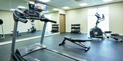 Fitness center at Quality Inn & Suites Kingston.