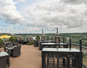 Hotel terrace with beautiful view and comfortable seating at Courtyard By Marriott Edmonton Downtown.