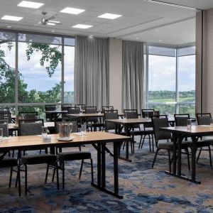 Professional meeting room with large windows at Courtyard By Marriott Edmonton Downtown.