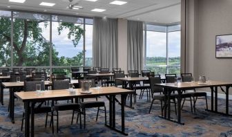 Professional meeting room with large windows at Courtyard By Marriott Edmonton Downtown.