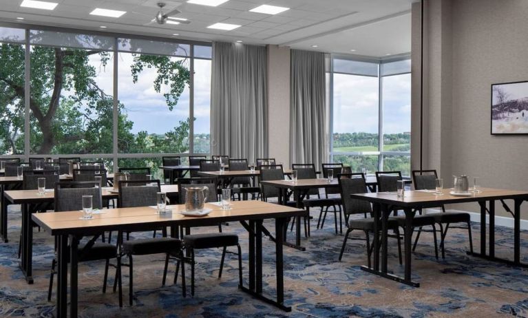 Professional meeting room with large windows at Courtyard By Marriott Edmonton Downtown.