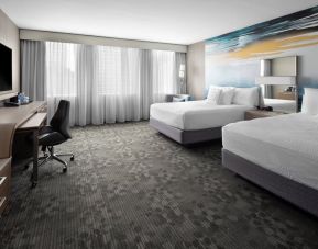 Day use twin room with TV, work desk and private bathroom at Courtyard By Marriott Edmonton Downtown.