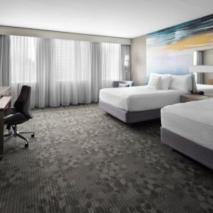 Day use twin room with TV, work desk and private bathroom at Courtyard By Marriott Edmonton Downtown.