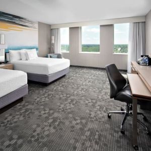 Bright and spacious day use twin room with TV, work desk and private bathroom at Courtyard By Marriott Edmonton Downtown.