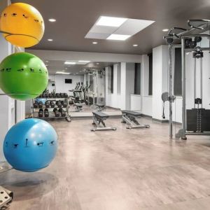 Fully equipped fitness center at Courtyard By Marriott Edmonton Downtown.