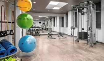 Fully equipped fitness center at Courtyard By Marriott Edmonton Downtown.