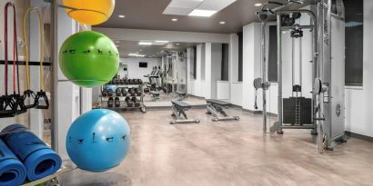 Fully equipped fitness center at Courtyard By Marriott Edmonton Downtown.