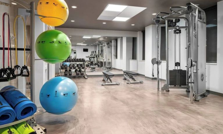 Fully equipped fitness center at Courtyard By Marriott Edmonton Downtown.