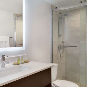 Private guest bathroom at DoubleTree By Hilton Hotel Toronto Airport West.