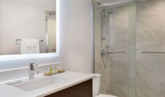 Private guest bathroom at DoubleTree By Hilton Hotel Toronto Airport West.