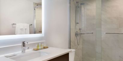 Private guest bathroom at DoubleTree By Hilton Hotel Toronto Airport West.