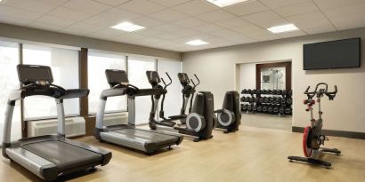 Fully equipped fitness center at DoubleTree By Hilton Hotel Toronto Airport West.