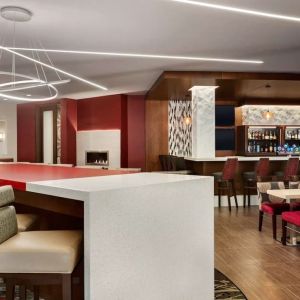 Stylish hotel bar with comfortable seating at DoubleTree By Hilton Hotel Toronto Airport West.