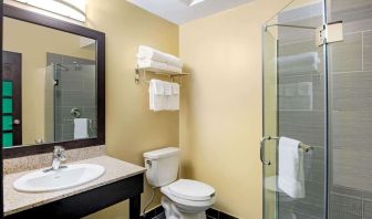 Private guest bathroom at La Quinta Inn & Suites By Wyndham Oshawa.