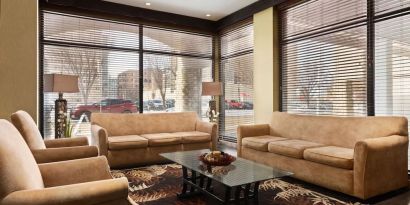 Hotel lobby with comfortable seating at Days Inn Edmonton Downtown.