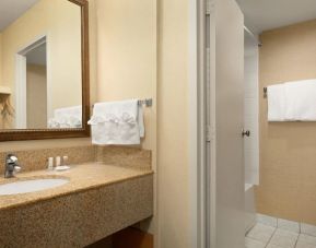 Private guest bathroom at Days Inn Edmonton Downtown.