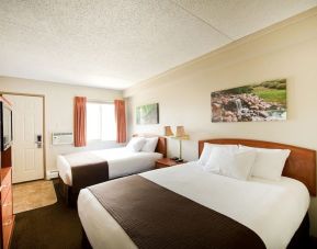 Bright and spacious day use twin room with TV, work desk and private bathroom at Riviera Motor Inn.