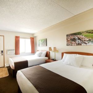 Bright and spacious day use twin room with TV, work desk and private bathroom at Riviera Motor Inn.