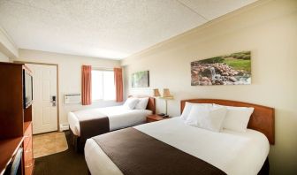 Bright and spacious day use twin room with TV, work desk and private bathroom at Riviera Motor Inn.