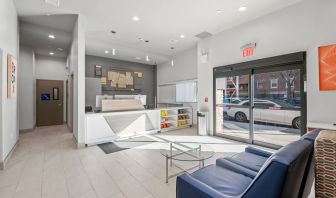 Reception area at Holiday Inn Express & Suites Bronx.