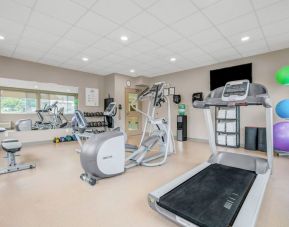 Fully equipped fitness center at Days Inn & Suites By Wyndham Lindsay.