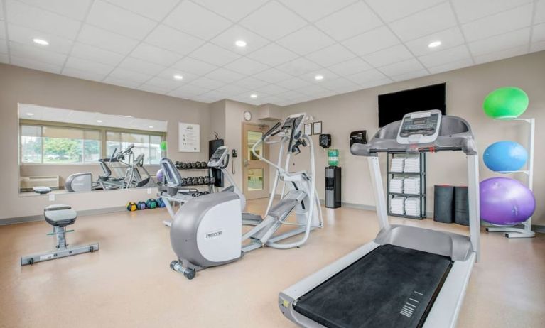 Fully equipped fitness center at Days Inn & Suites By Wyndham Lindsay.