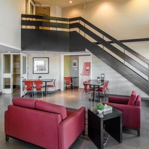 Hotel lobby and lounge area with fireplace, perfect for co-working at Comfort Inn Swift Current.