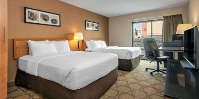 Day use twin room with TV and work desk at Comfort Inn Swift Current.