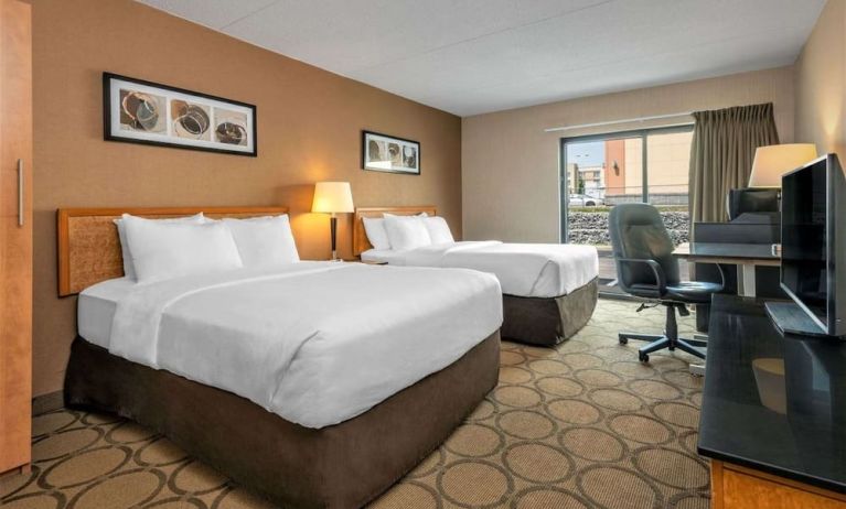 Day use twin room with TV and work desk at Comfort Inn Swift Current.