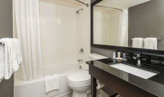 Guest bathroom with tub and free toiletries at Comfort Inn Sudbury Regent Street.